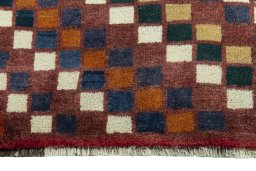 Central medallion detail of 2000s Persian Gabbeh rug from Iran / Persia