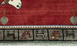 Central medallion detail of 2000s Persian Gabbeh rug from Iran / Persia