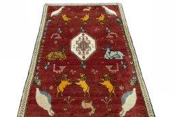 Surface texture of 2000s Persian Gabbeh rug with natural Wool and intricate pattern