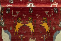 Full view of 2000s Persian Gabbeh rug from Iran / Persia, 193 × 112 cm in Red tones
