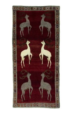 Full view of 2000s Persian Gabbeh rug from Iran / Persia, 235 × 110 cm in Red tones