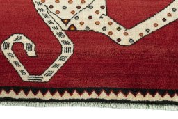 Central medallion detail of 2000s Persian Gabbeh rug from Iran / Persia