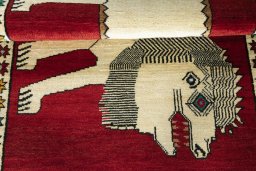 Full view of 2000s Persian Gabbeh rug from Iran / Persia, 158 × 102 cm in Red tones