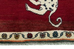 Central medallion detail of 2000s Persian Gabbeh rug from Iran / Persia