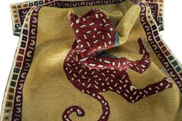 Corner detail of 2000s Persian Gabbeh rug showing border pattern and Wool pile