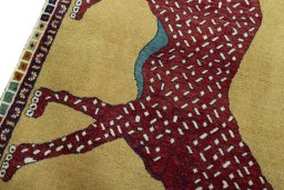 Backside of handmade 2000s Persian Gabbeh rug showing knot structure and weave density