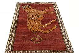Surface texture of 1970s Persian Gabbeh rug with natural Wool and intricate pattern
