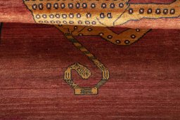 Full view of 1970s Persian Gabbeh rug from Iran / Persia, 180 × 122 cm in Red tones