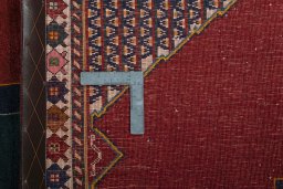 Close-up detail of 2000s Persian Gabbeh rug from Iran / Persia showing Wool weave