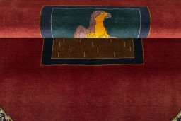 Full view of 2000s Persian Gabbeh rug from Iran / Persia, 171 × 132 cm in Red tones