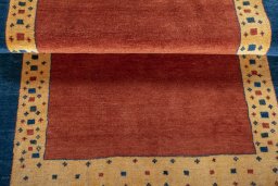 Full view of 2000s Persian Gabbeh rug from Iran / Persia, 150 × 104 cm in Red tones