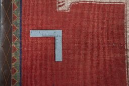 Close-up detail of 2000s Persian Gabbeh rug from Iran / Persia showing Wool weave