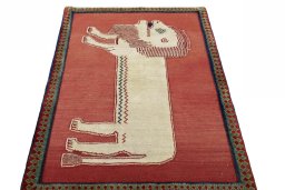 Surface texture of 2000s Persian Gabbeh rug with natural Wool and intricate pattern