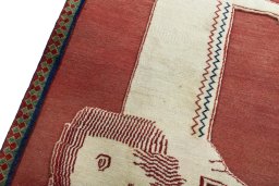 Backside of handmade 2000s Persian Gabbeh rug showing knot structure and weave density