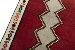 Backside of handmade 2000s Persian Gabbeh rug showing knot structure and weave density