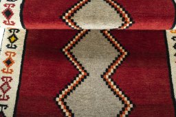 Full view of 2000s Persian Gabbeh rug from Iran / Persia, 195 × 100 cm in Red tones