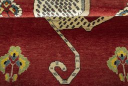 Full view of 2000s Persian Gabbeh rug from Iran / Persia, 188 × 135 cm in Red tones