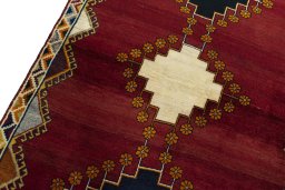 Backside of handmade 2000s Persian Gabbeh rug showing knot structure and weave density