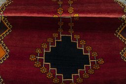Full view of 2000s Persian Gabbeh rug from Iran / Persia, 194 × 120 cm in Red tones