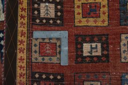 Close-up detail of 2000s Persian Gabbeh rug from Iran / Persia showing Wool weave