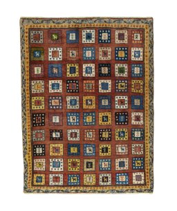 Full view of 2000s Persian Gabbeh rug from Iran / Persia, 133 × 102 cm in Red tones