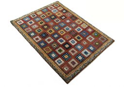 Close-up detail of 2000s Persian Gabbeh rug from Iran / Persia showing Wool weave