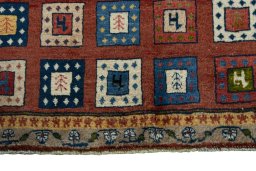 Central medallion detail of 2000s Persian Gabbeh rug from Iran / Persia