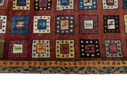 Close-up detail of 2000s Persian Gabbeh rug from Iran / Persia showing Wool weave