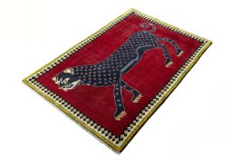 Corner detail of 2000s Persian Gabbeh rug showing border pattern and Wool pile