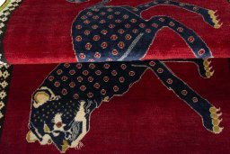 Full view of 2000s Persian Gabbeh rug from Iran / Persia, 164 × 110 cm in Red tones