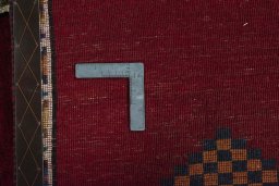 Close-up detail of 2000s Persian Gabbeh rug from Iran / Persia showing Wool weave