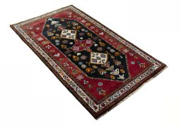 Close-up detail of 2000s Persian Gabbeh rug from Iran / Persia showing Wool weave