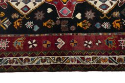 Close-up detail of 2000s Persian Gabbeh rug from Iran / Persia showing Wool weave