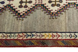Close-up detail of 2000s Persian Gabbeh rug from Iran / Persia showing Wool weave
