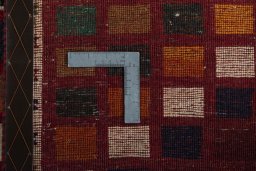 Close-up detail of 2000s Persian Gabbeh rug from Iran / Persia showing Wool weave