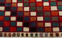 Central medallion detail of 2000s Persian Gabbeh rug from Iran / Persia