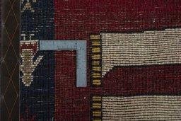 Close-up detail of 2000s Persian Gabbeh rug from Iran / Persia showing Wool weave