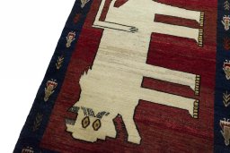 Backside of handmade 2000s Persian Gabbeh rug showing knot structure and weave density