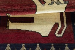 Full view of 2000s Persian Gabbeh rug from Iran / Persia, 145 × 105 cm in Red tones