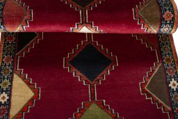 Full view of 2000s Persian Gabbeh rug from Iran / Persia, 184 × 85 cm in Red tones