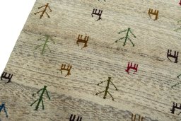 Backside of handmade 2000s Persian Gabbeh rug showing knot structure and weave density