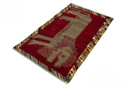Corner detail of 2000s Persian Gabbeh rug showing border pattern and Wool pile