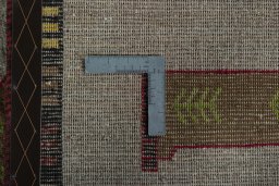 Close-up detail of 2000s Persian Gabbeh rug from Iran / Persia showing Wool weave