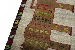 Backside of handmade 2000s Persian Gabbeh rug showing knot structure and weave density