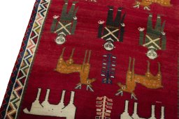 Backside of handmade 2000s Persian Gabbeh rug showing knot structure and weave density
