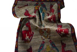 Corner detail of 2000s Persian Gabbeh rug showing border pattern and Wool pile