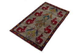 Corner detail of 2000s Persian Gabbeh rug showing border pattern and Wool pile