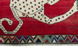 Central medallion detail of 2000s Persian Gabbeh rug from Iran / Persia