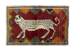 Full view of 2000s Persian Gabbeh rug from Iran / Persia, 186 × 120 cm in Red tones