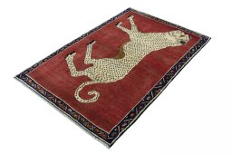 Corner detail of 2000s Persian Gabbeh rug showing border pattern and Wool pile